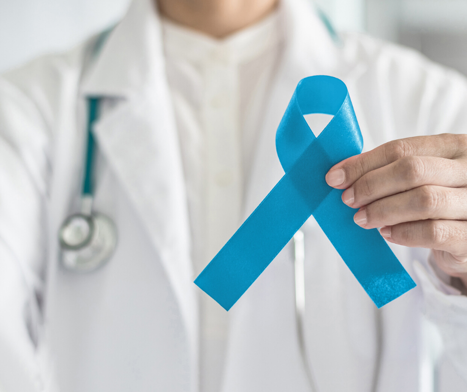 Doctor with a blue ribbon for prostate disease awareness. 