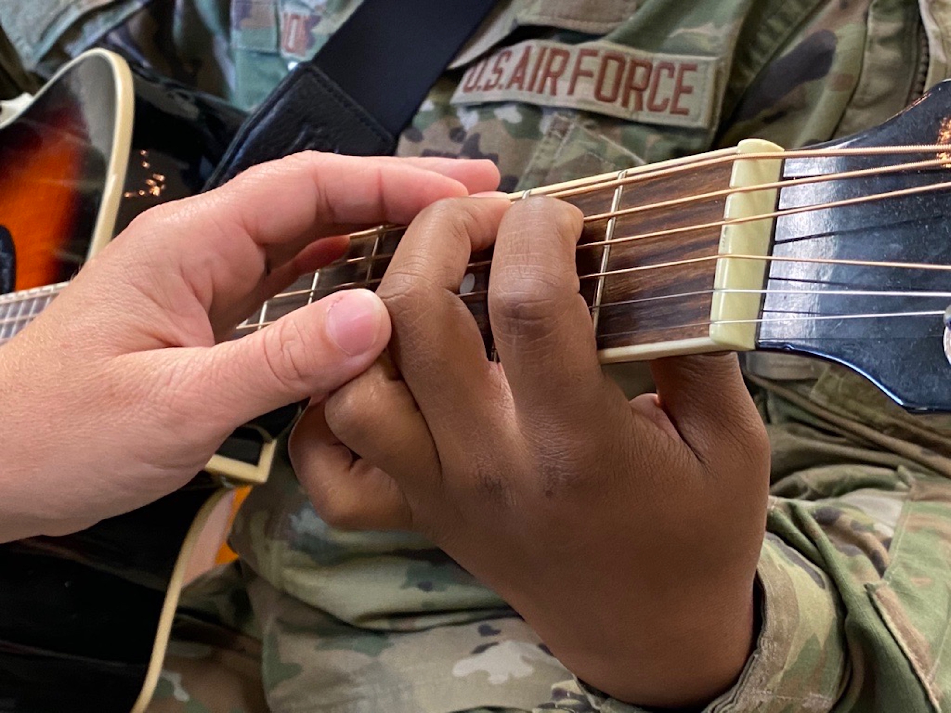 person holding a guitar