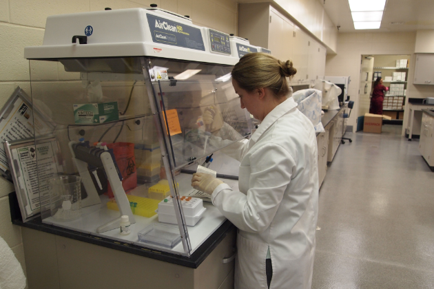 Woman working with chemical hood