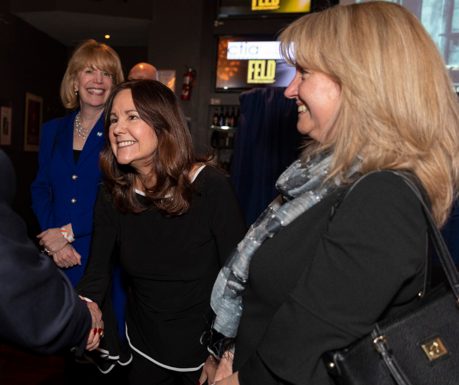 Mrs. Pence with two HJF teammates at a reception in March 2019.