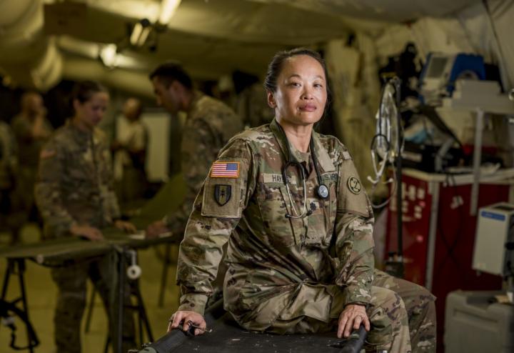 Middle aged woman who is an Army physician.