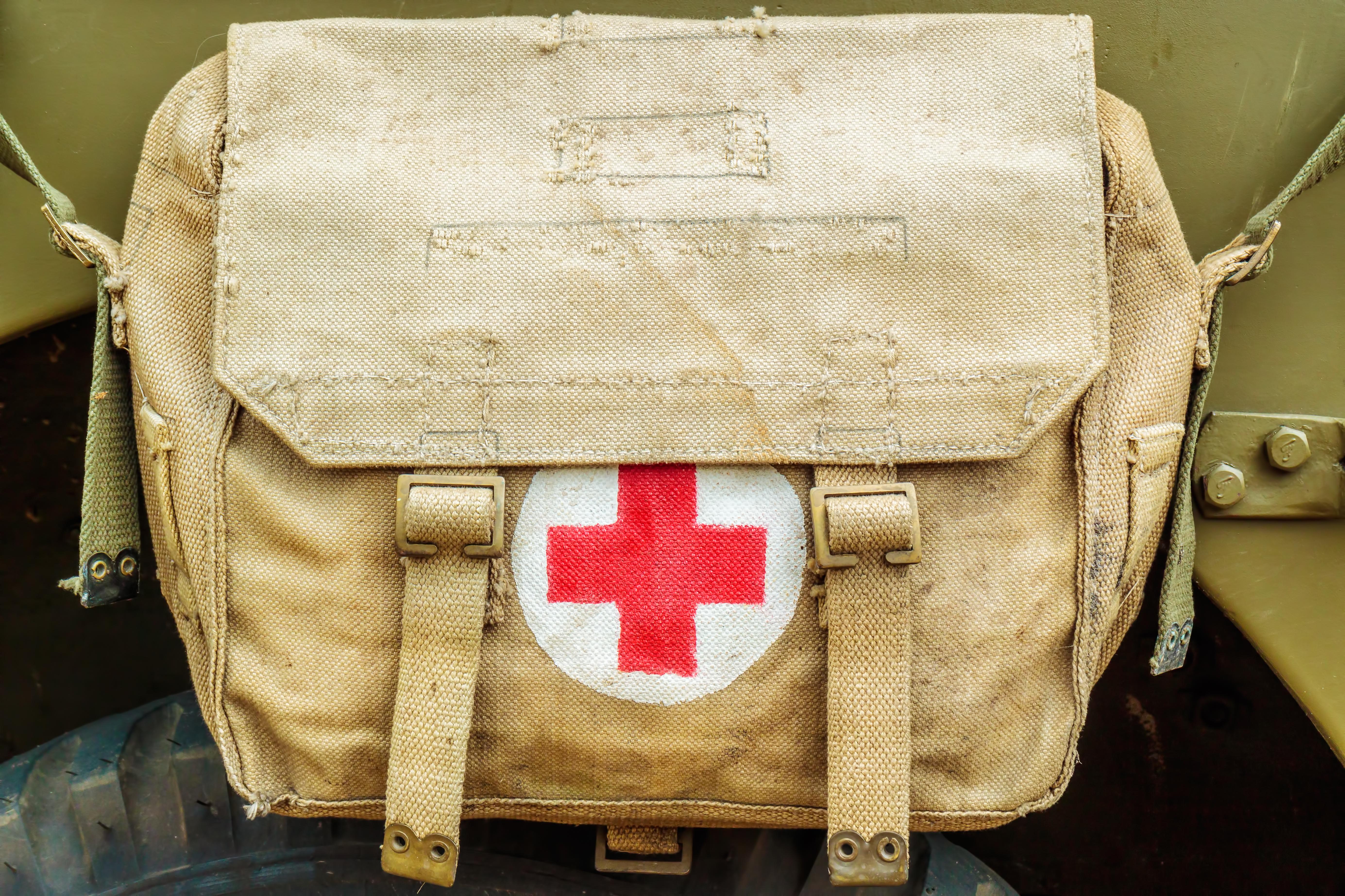 Medical bag with red cross on it