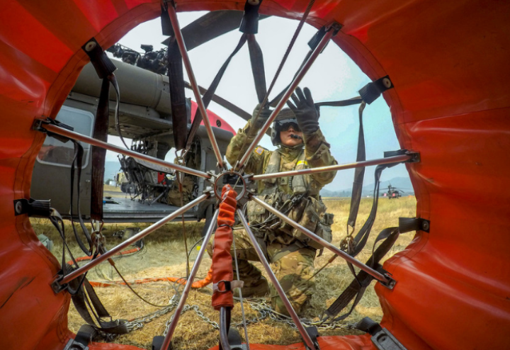 Soldier inspecting equipment